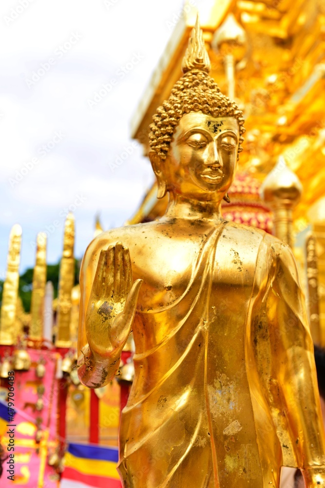 Hand of Buddha statue around the Golden pagoda Wat PhraThat Doi SuThep Chiang Mai province, Thailand.