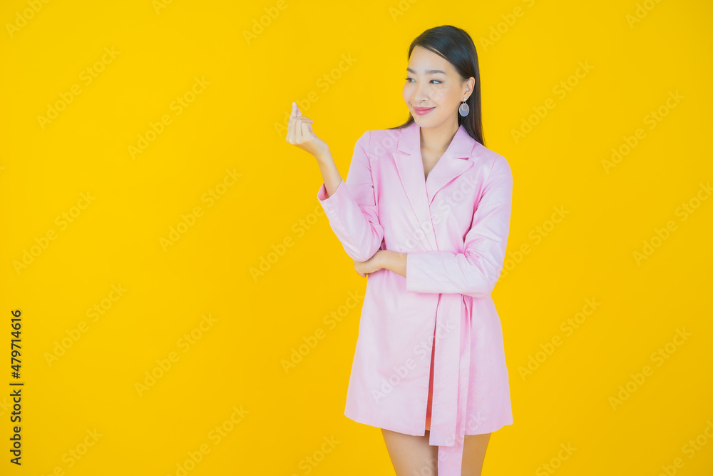 Portrait beautiful young asian woman smile with action Portrait beautiful young asian woman smile with action