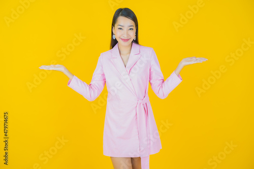 Portrait beautiful young asian woman smile with action