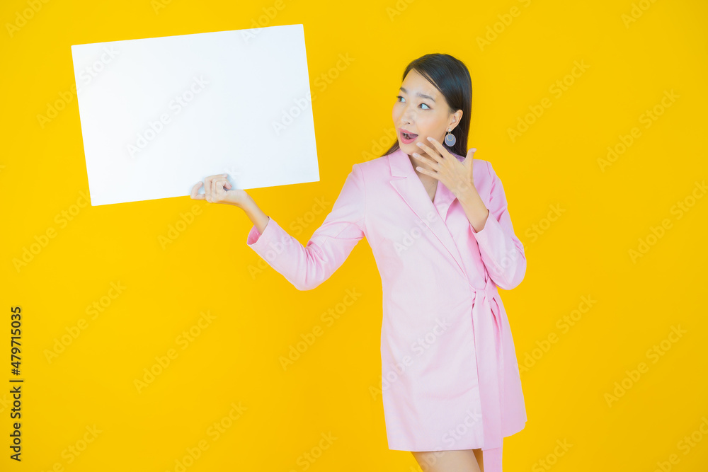 Portrait beautiful young asian woman with empty white billboard Portrait beautiful young asian woman with empty white billboard