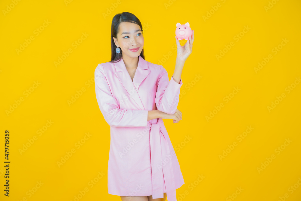 Portrait beautiful young asian woman with piggy bank Portrait beautiful young asian woman with piggy bank