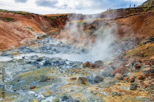 In Iceland, Hveragerdi is a geothermal field in the Krafla caldera area full of steam openings, sulfur deposits photo