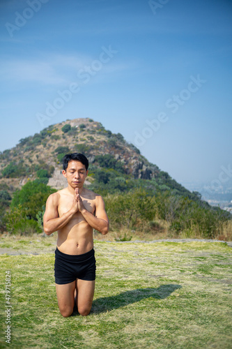 young man thanking for yoga class, training, yoga, mountains background, health, healthy, selective focus, defocused