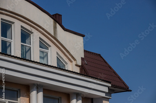 Fragment of Modern residential apartment with flat buildings exterior. Detail of New luxury house and home complex. Part of City Real estate property and condo architecture. Copy space © Oleh Marchak