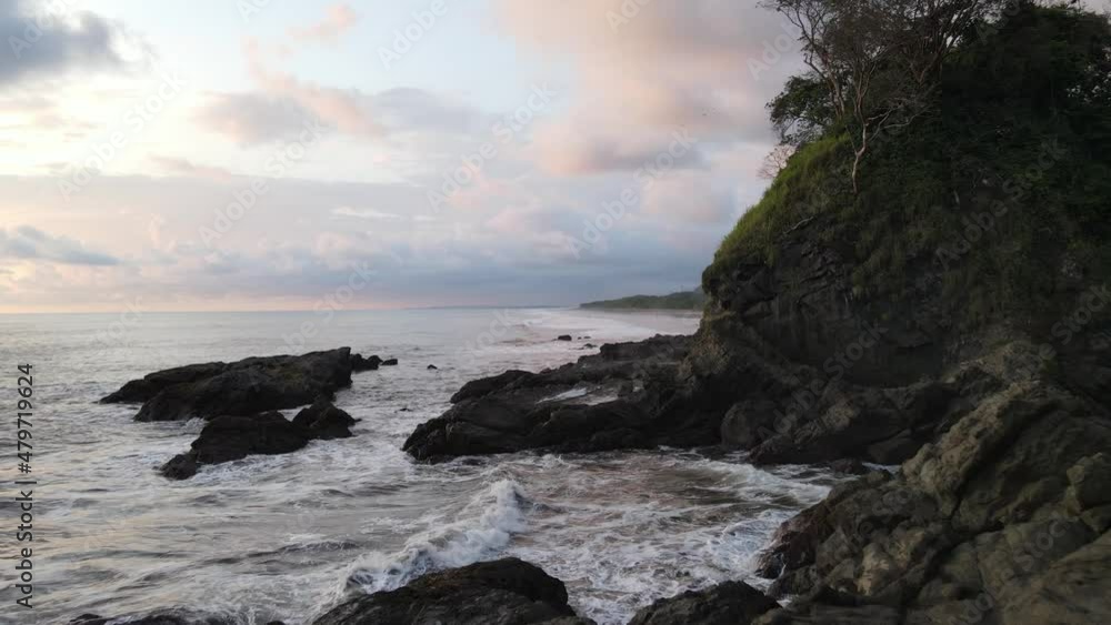 Drone flying over rocks and Pacific Ocean on the coast of Costa Rica Drone flying over rocks and Pacific Ocean on the coast of Costa Rica