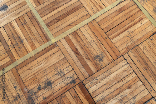 Old used parquet with square pattern  top view
