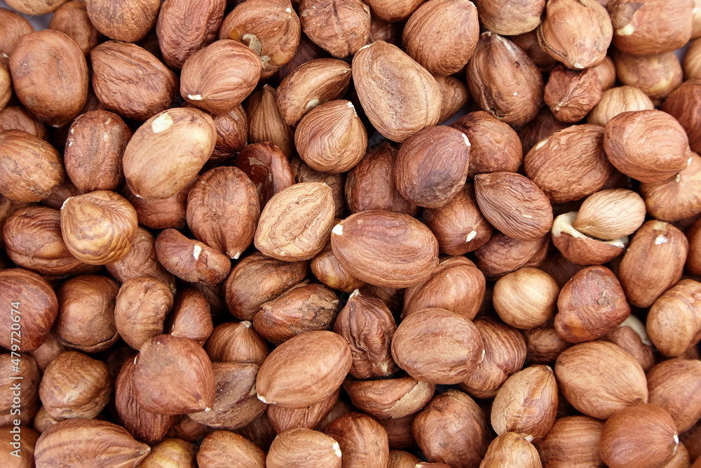 Shelled raw hazelnuts background closeup Shelled raw hazelnuts background closeup