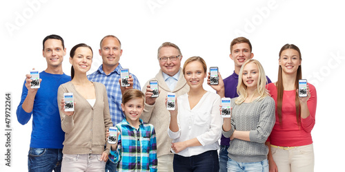 health, pandemic and technology concept - group of people showing smartphones with qr codes and certificates of vaccination on screens over white background