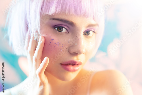 Canvas Young modern blond woman with perfect hydrated skin and sparkles on face