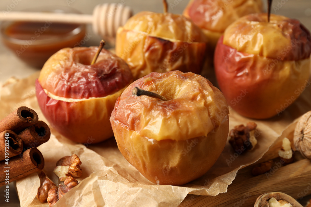 Concept of tasty food with baked apples, close up Concept of tasty food with baked apples, close up