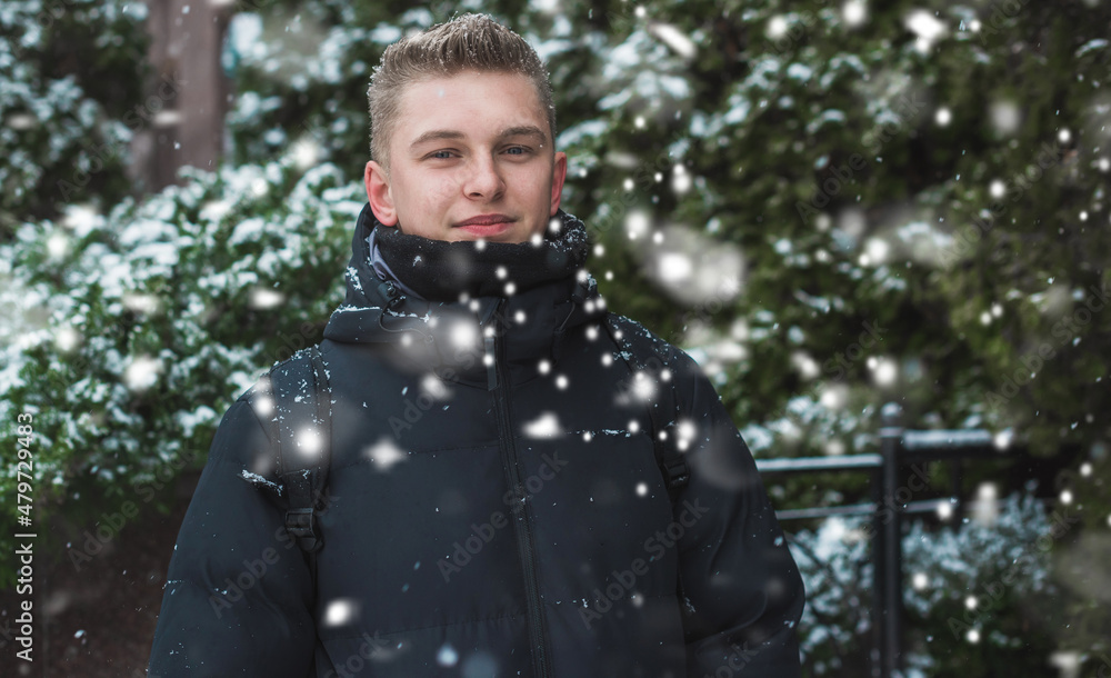 Portrait of young blonde guy Nordic appearance, lifestyle of young people. Handsome guy close up, winter day thinking about something Portrait of young blonde guy Nordic appearance, lifestyle of young people. Handsome guy close up, winter day thinking about something