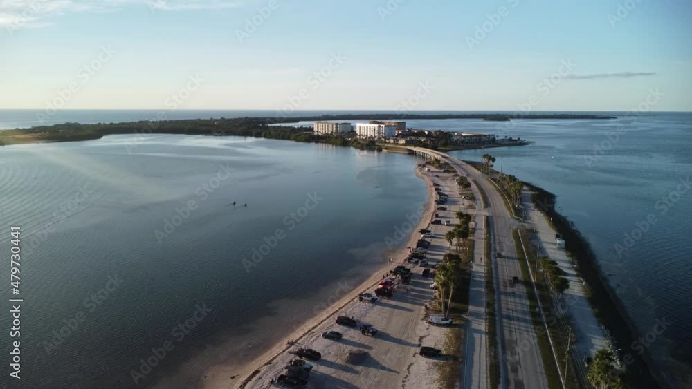 This shot is part of a 2 shot collection filled with boats, kayaks, water and bridges. Overlooking the Gulf of Mexico the causeway leads to Honeymoon Island. This shot is part of a 2 shot collection filled with boats, kayaks, water and bridges. Overlooking the Gulf of Mexico the causeway leads to Honeymoon Island.