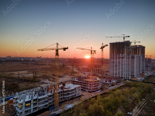 New houses construction site at sunset