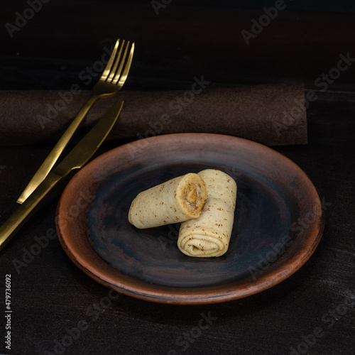 Pancakes on a ceramic plate
