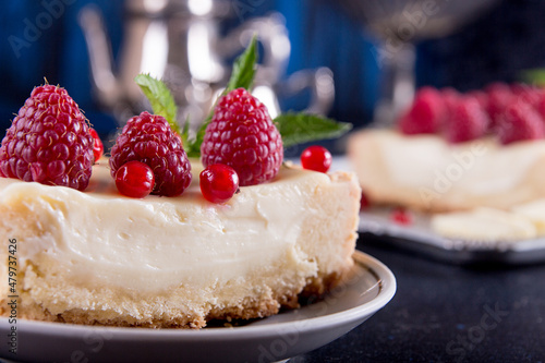 Vászonkép Tarte shortcake with mascarpone, white chocolate and cream served with fresh raspberries and red currant
