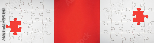 Empty white details of puzzle on red background banner panorama  with space for text