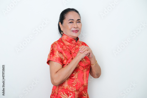 Elderly Asian woman wearing Chinese costume called 