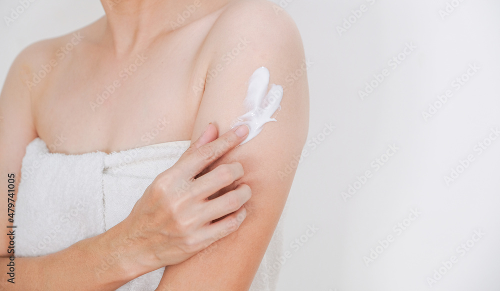 Woman applying cream,lotion on arm with white background, Beauty concept. Woman applying cream,lotion on arm with white background, Beauty concept.