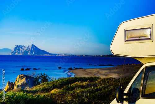 Caravan on spanish coast, Gibraltar rock on horizon photo