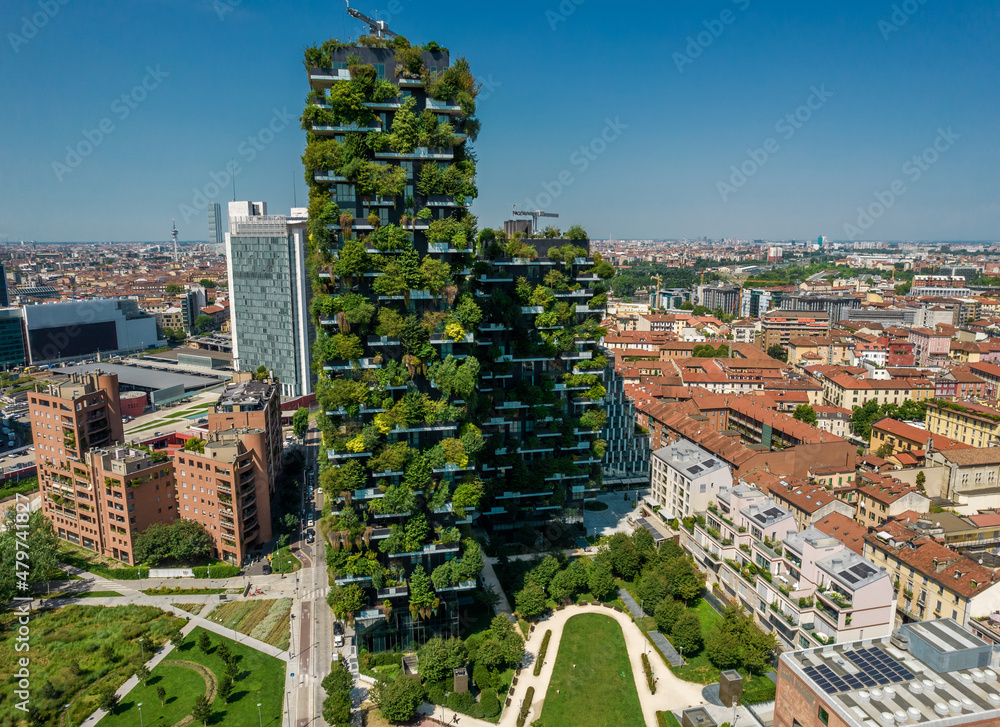 Obraz premium Aerial photo of Bosco Verticale, Vertical Forest, in Milan, Porta Nuova district. Residential buildings with many trees and other plants in balconies