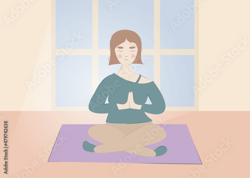 Cute girl sits on the rug and does yoga. background room