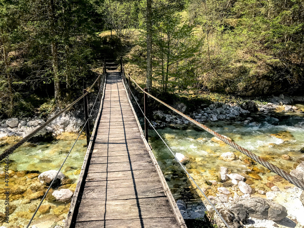 wooden bridge in Bovec village in Triglav National Park, Slovenia wooden bridge in Bovec village in Triglav National Park, Slovenia