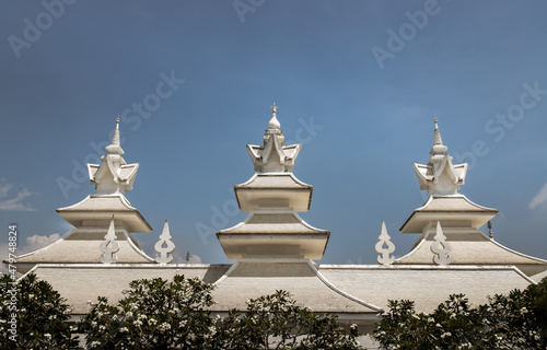 Chiang Rai, Thailand - Sep 05, 2020 : Elaborate sculptures at the famous Wat Rong Khun (White Temple) in Chiang Rai, Thailand. Selective Focus. photo