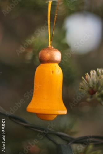 christmas bell on the tree © Lina