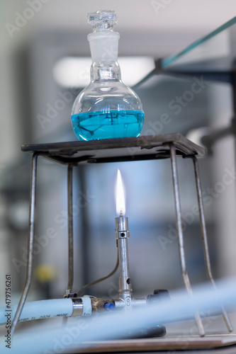 Lit bunsen in the chemistry laboratory © fabio