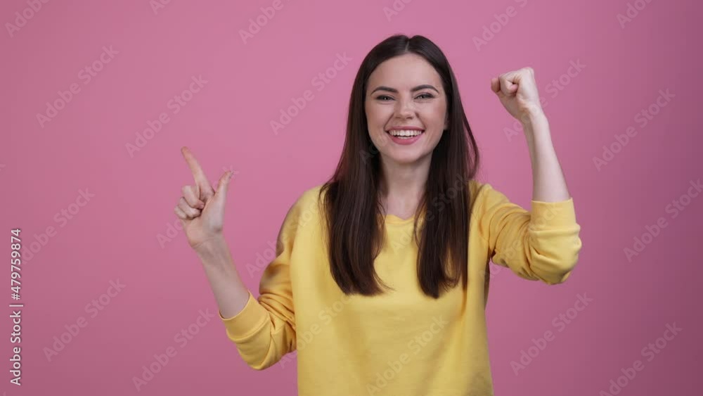 Girlish lady point empty space ads fist up isolated pastel color background