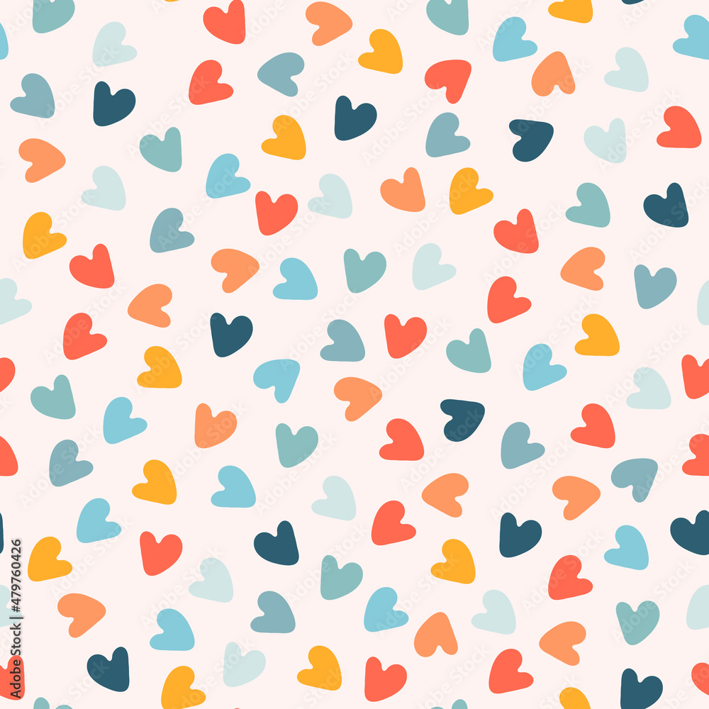 Fototapeta premium Seamless pattern with hand drawn multicolored heart shapes on pink background, for wrapping paper and other design projects. Valentines Day concept, love, romance concept