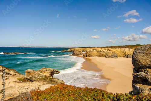 Huge sandy beach called Praia Grande de Porto Covo, Vicentina Route, Portugal. photo