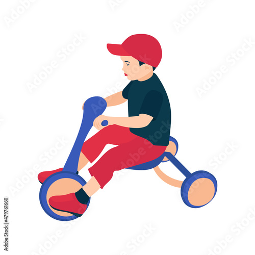 A boy on a tricycle.