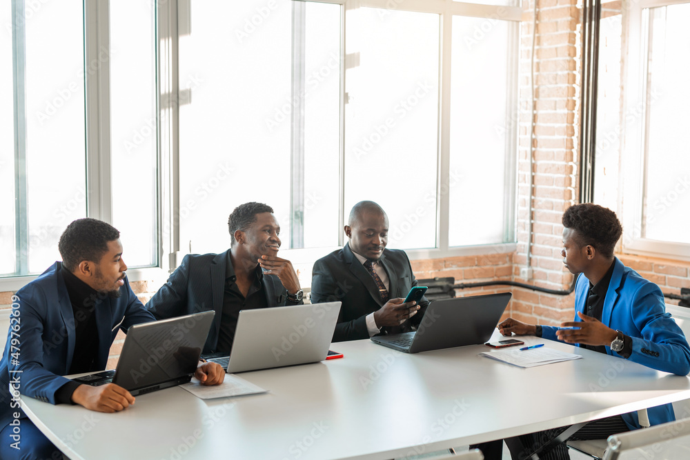 african business people at the table with laptops african business people at the table with laptops
