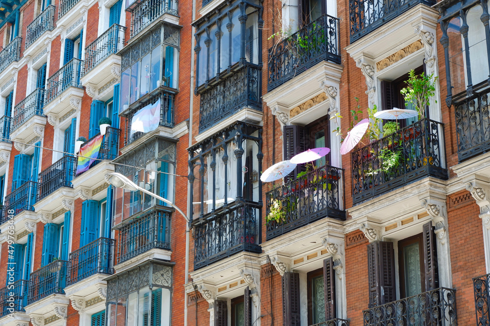 Colourful facades with classy windows and balconies downtown Madrid, capital of Spain