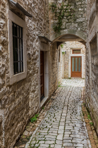 Narrow alley in the old town of Trogir  Croatia