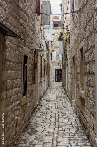Narrow alley in the old town of Trogir, Croatia © Matyas Rehak