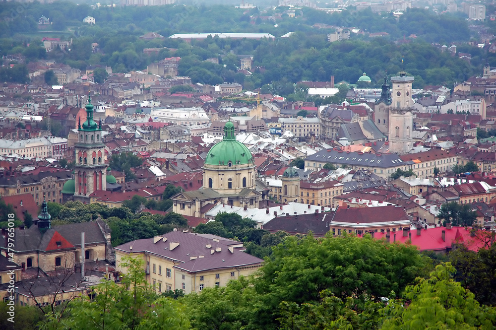 Fototapeta premium View of Lviv in Ukraine from the Union of Lublin Mound. This viewpoint provides a good vantage point overlooking the city of Lviv. Lviv is also known as Lvov.