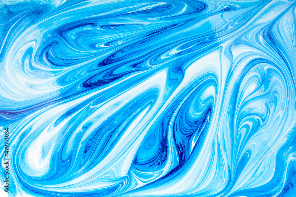 fluid acrylic abstract painting on a white canvas