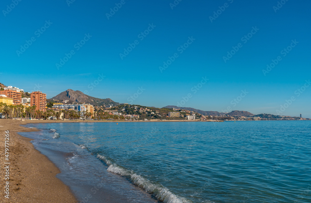 Beautiful Malagueta beach and its palm trees in the city of Malaga, Andalusia. Spain