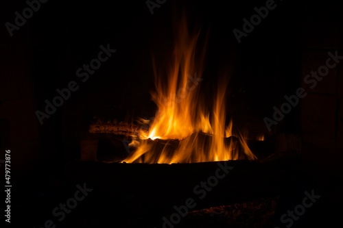 Beautiful wood fire in an old fireplace