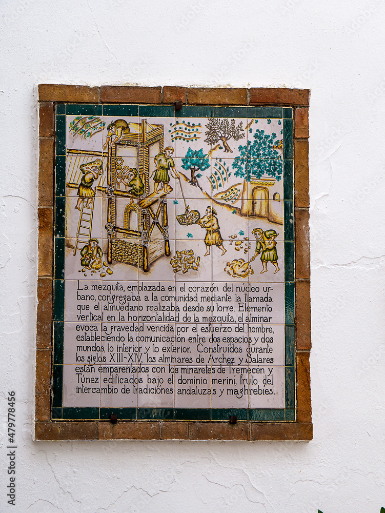  A plaque depicting the construction of the Minaret tower in Archez in the mountains above Malaga in Spain. It is on the Christian church in the village which used to be an Islamic mosque