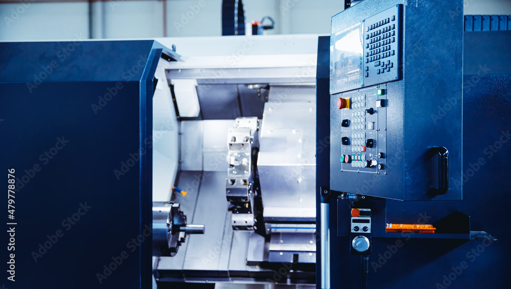 Manual labor automation, modern technologies. Control panel CNC Industrial drill robot for detail machine factory Manual labor automation, modern technologies. Control panel CNC Industrial drill robot for detail machine factory