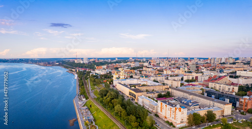 Aerial top view panorama city Perm and central embankment of Kama river Russia, sunset drone photo © Parilov