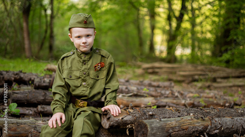 Children in military uniform of the USSR, Military children, Child soldiers,  Children in nature,  a boy in military uniform