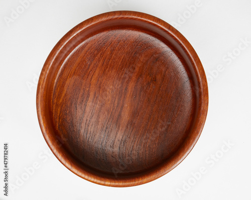 Handmade Teak Serving Bowl with Flared Base. Turned wood bowl. Kitchenware wish. View from above.