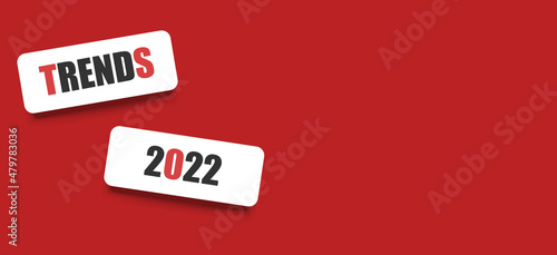 2022 trends on a red background. Business strategy and creative idea.