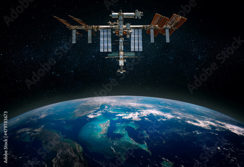 Fototapeta Naklejka Na Ścianę i Meble -  The International Space Station orbiting planet Earth. Scientific space exploration using a space station.. Elements of this image furnished by NASA. 