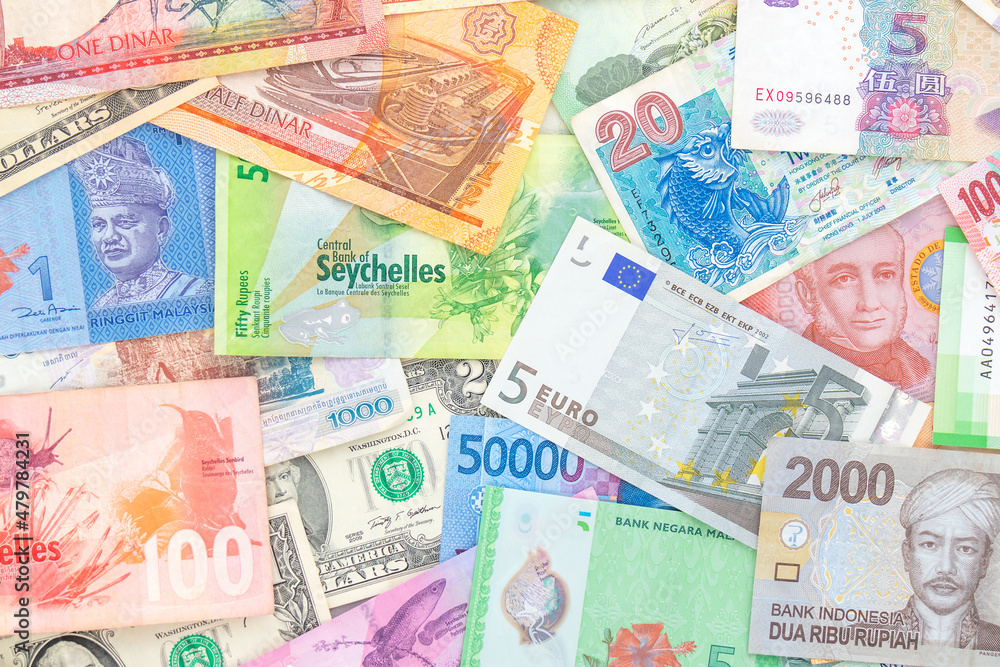 Background from paper money of different countries. Dollar, euro banknotes and others. View from above. Background from paper money of different countries. Dollar, euro banknotes and others. View from above.