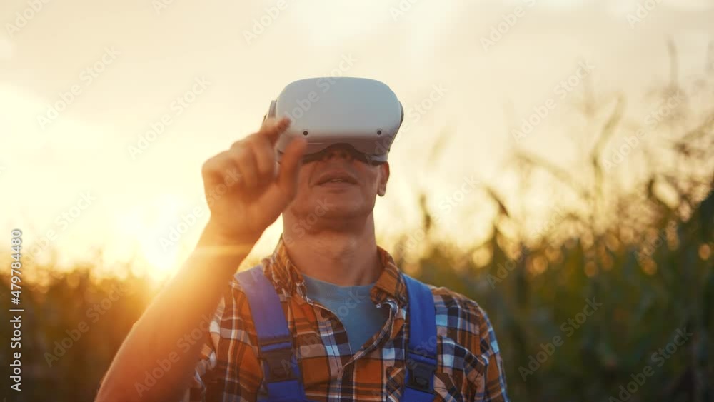 agriculture technology. smart agriculture a corn field business concept. farmer with eco virtual reality glasses. farmer working in corn field agriculture. virtual reality glasses study harvest agriculture technology. smart agriculture a corn field business concept. farmer with eco virtual reality glasses. farmer working in corn field agriculture. virtual reality glasses study harvest